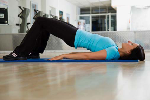 woman doing abdominal stretch=